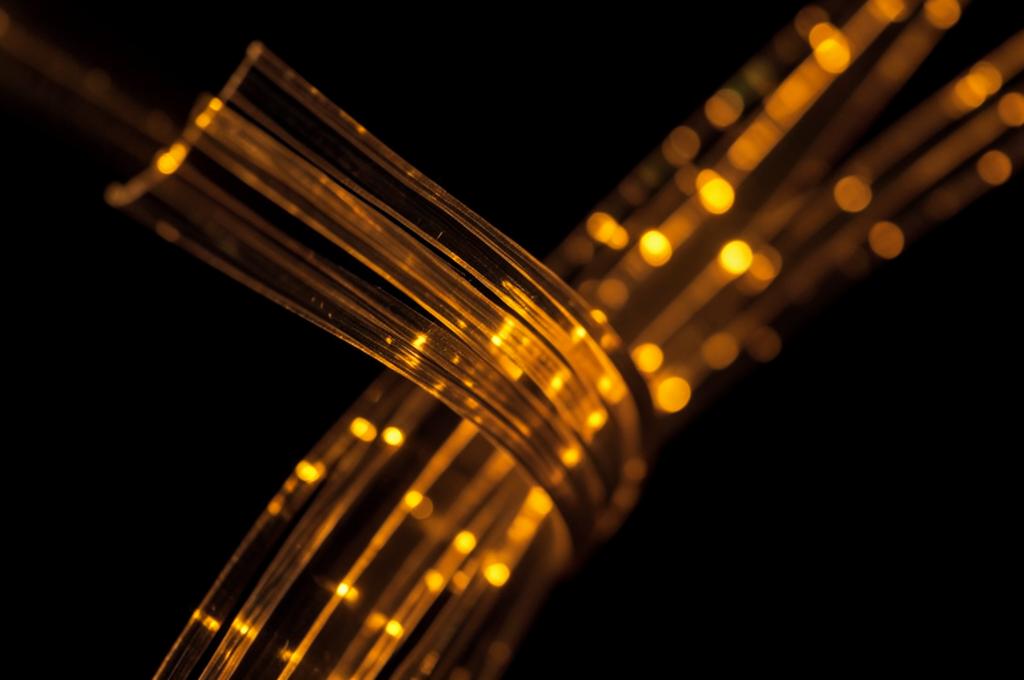 Macro photo of glowing fibre optic cables